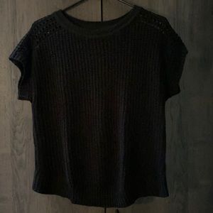 Black sweater.  Size M.... fits like a Large... maybe XL.